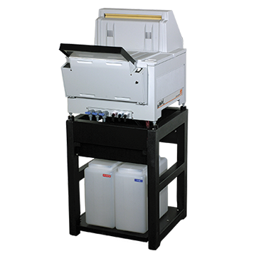 Automatic X-ray film processor on a chemical stand